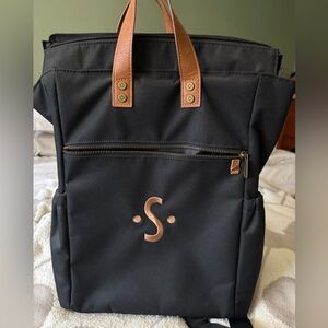 Stylish Black Thirty One Insulated Backpack with Tan Accents.